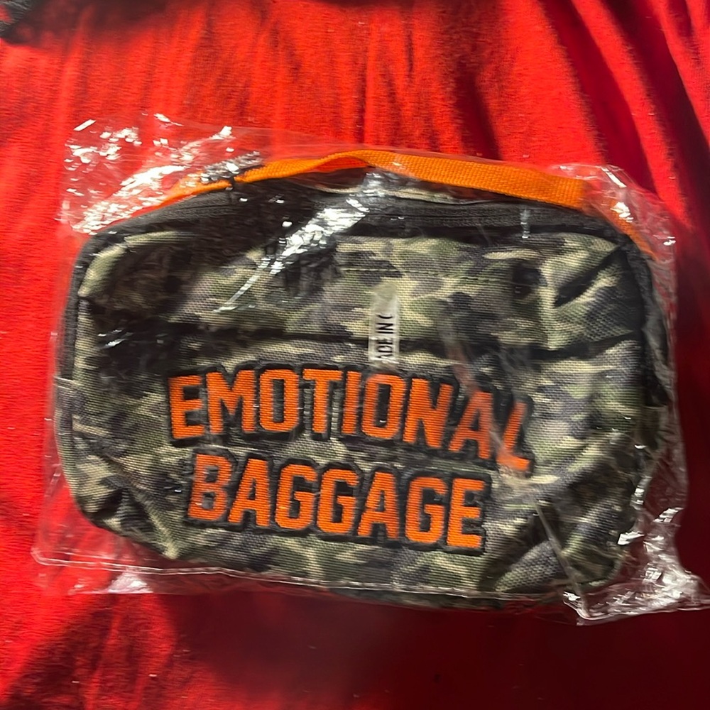 EUC ALF Fanny pack or crossbody. It is green camo with orange!